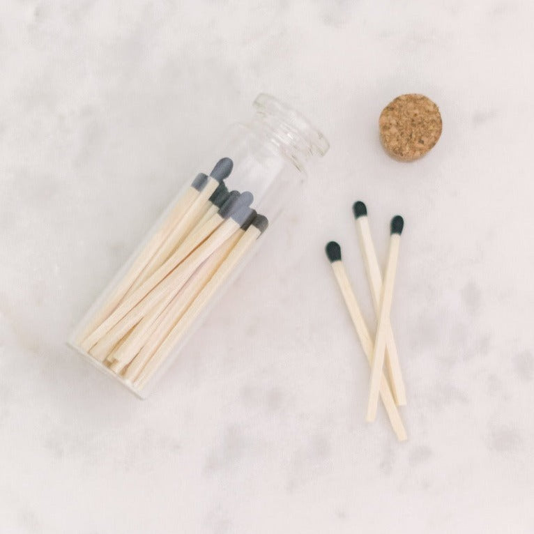 Black Tip Matches in a glass vial