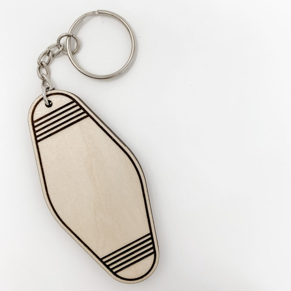 blank wooden motel keychain that can be engraved with an engraving of your choice. Custom wooden keychain.